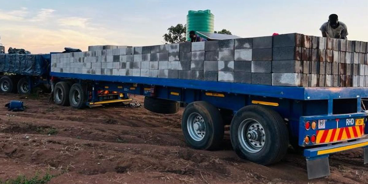 Semi trailer transporting building materials